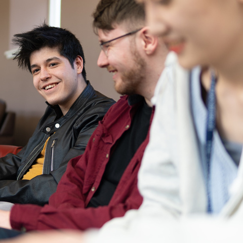 Students chatting in communal area 
