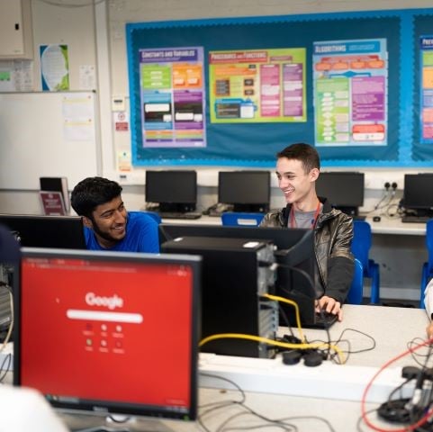 Students using the UCAS Hub in a classroom