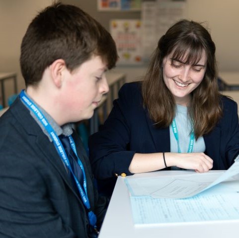 Adviser and student chatting