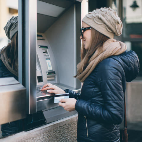 Student using an ATM