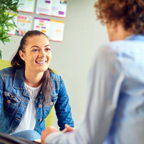 Adviser talking to a student