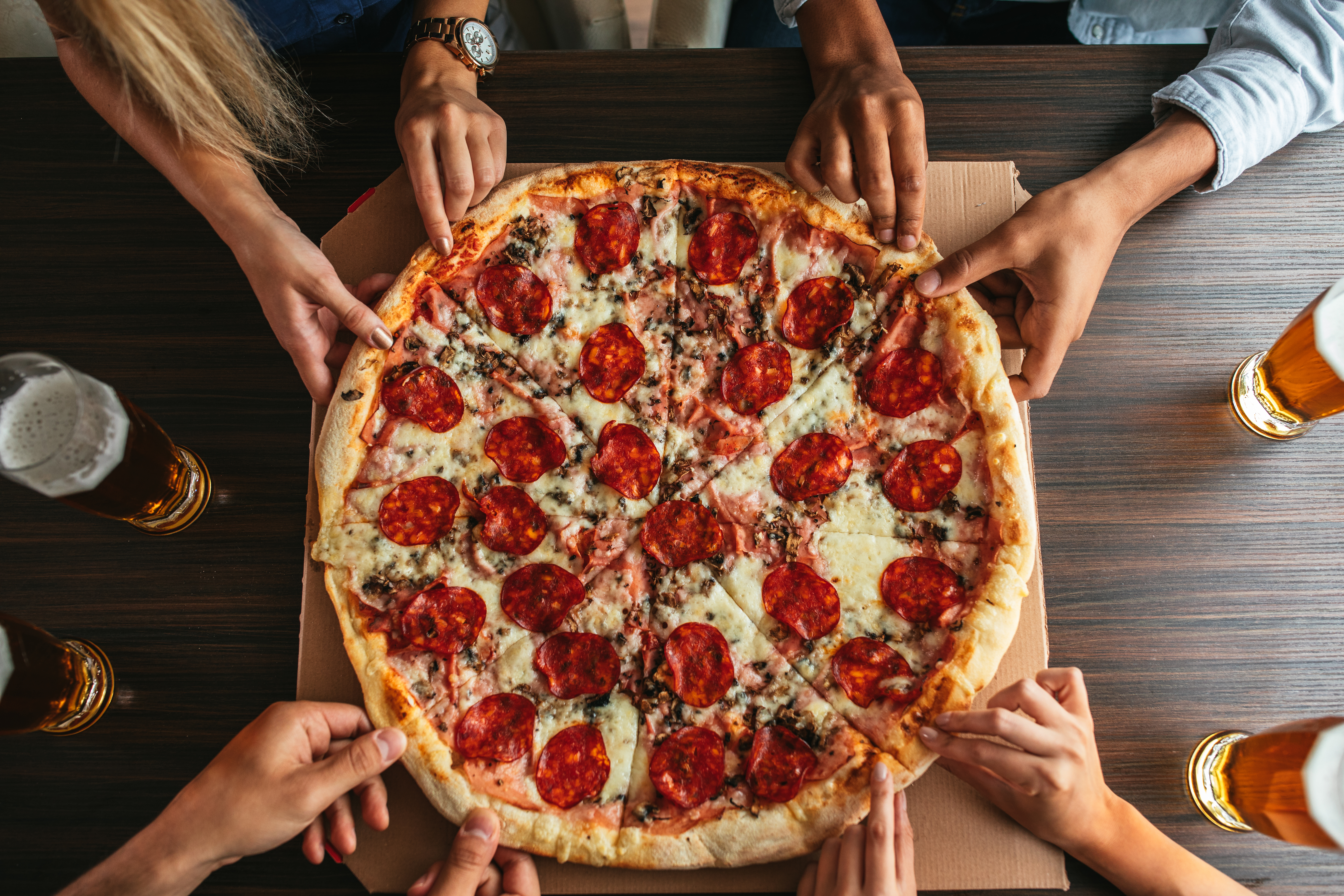 People eating pizza People eating pizza