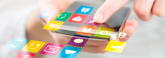 Hand selecting apps on a mobile phone