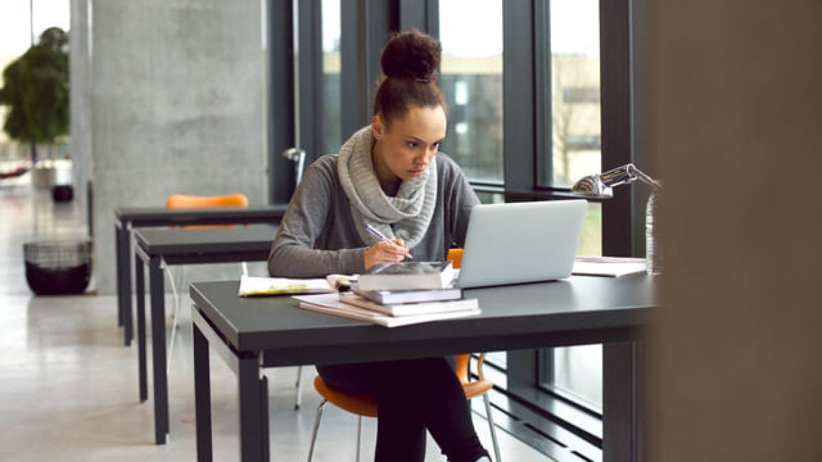 Care experienced student working on laptop