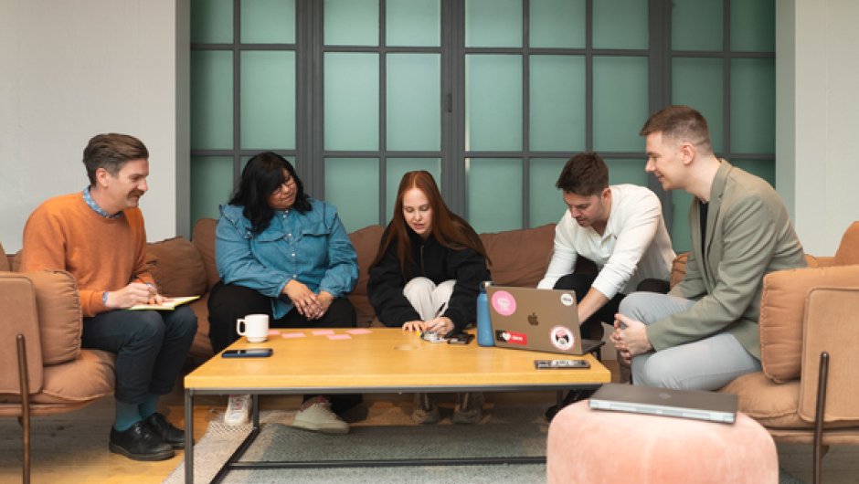 Apprentices in a meeting in workplace