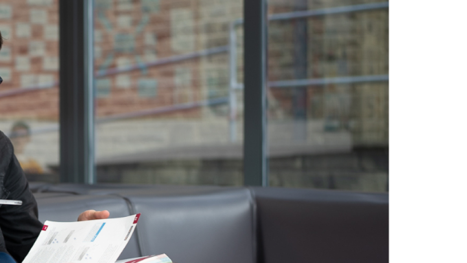 Industry_Marketing_Early_Careers_Article_010324 Two students sat looking at a mobile device
