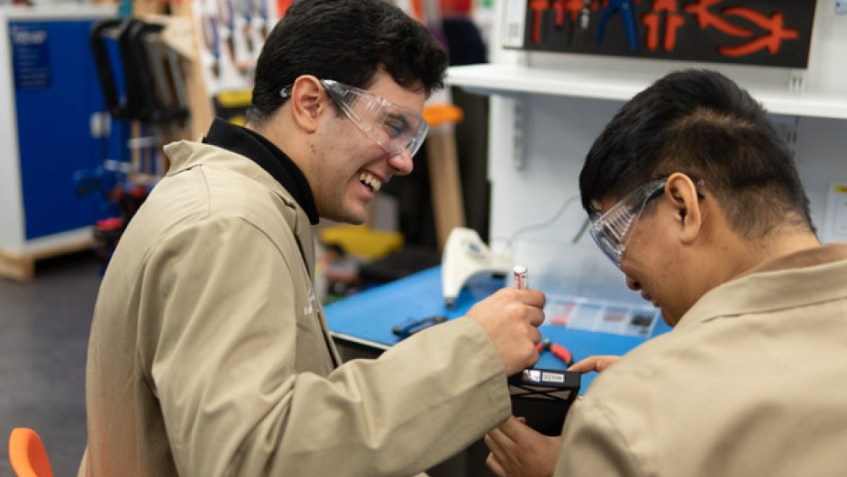 Engineering apprentices in workshop