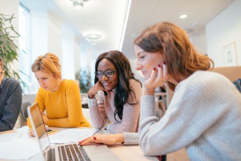 Apprentices in a meeting