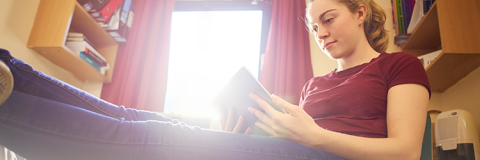 Student reading a book