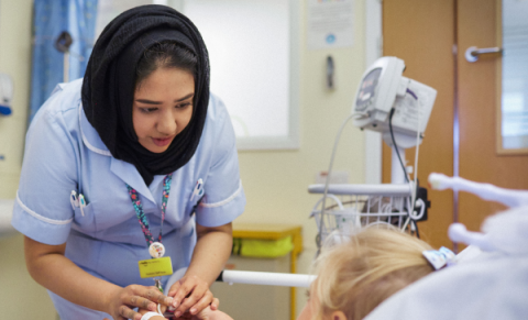 nurse hero banner nurse looking after a patient