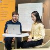 Student talking to adviser 